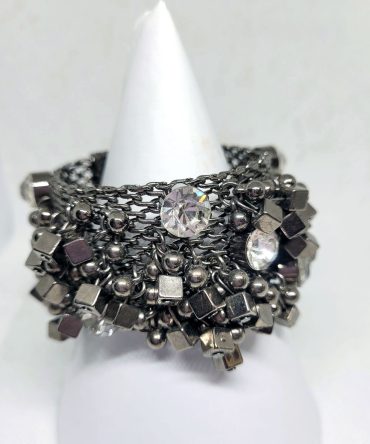 Chunky metal detail and white gem bracelet