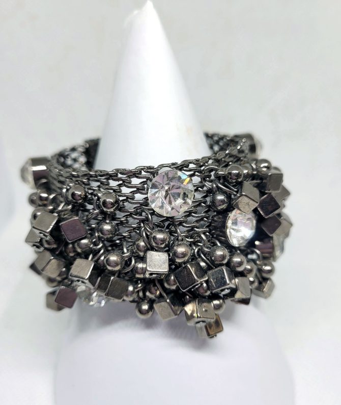 Chunky metal detail and white gem bracelet