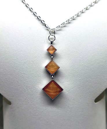 Three square amber colour drop necklace
