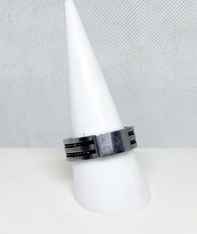 Silver band black striped ring