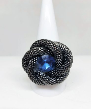 Black swirl ring blue stone