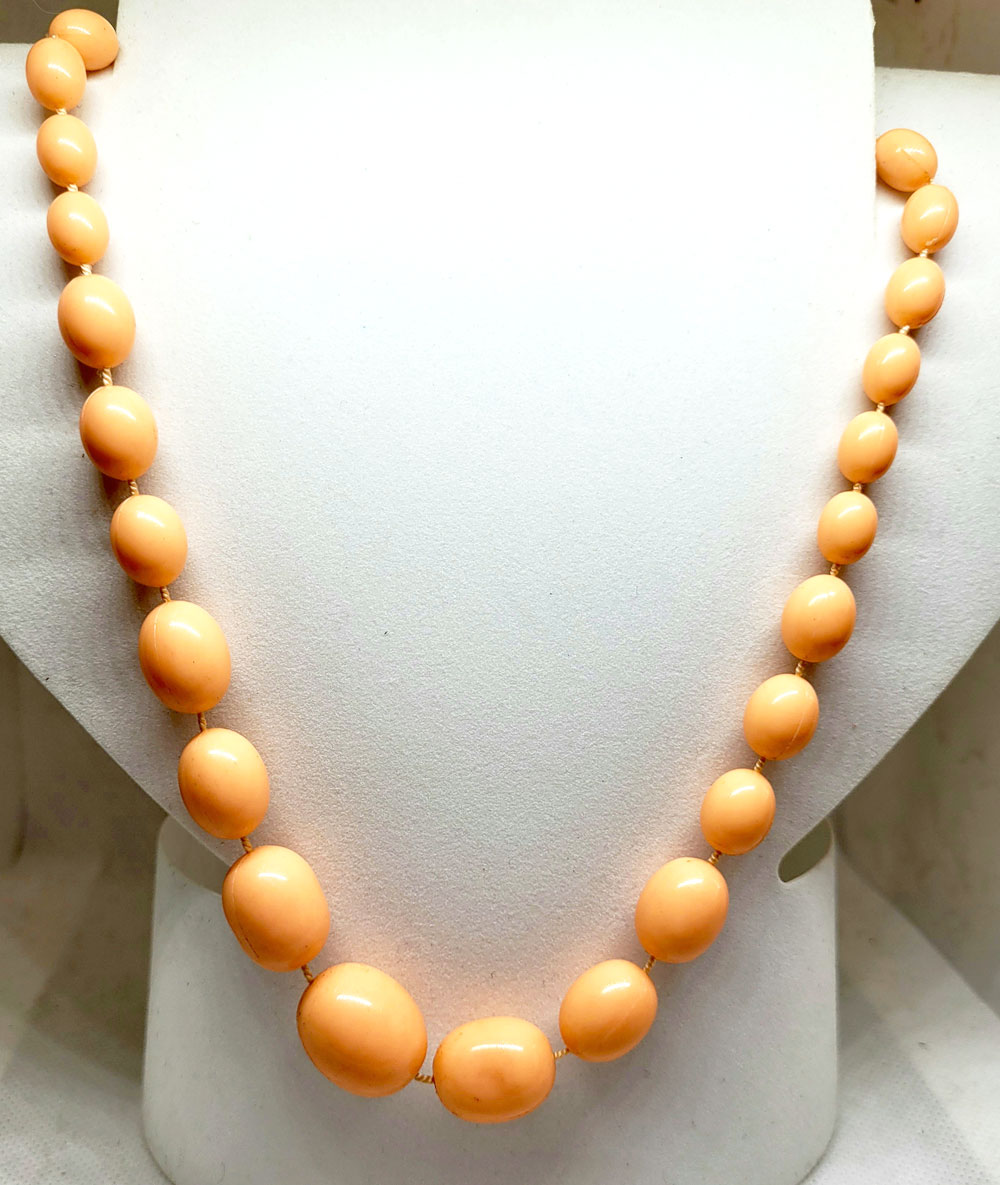 Orange best sale pearl necklace