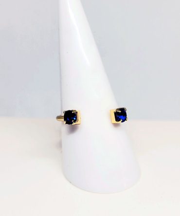Blue stone open gold ring