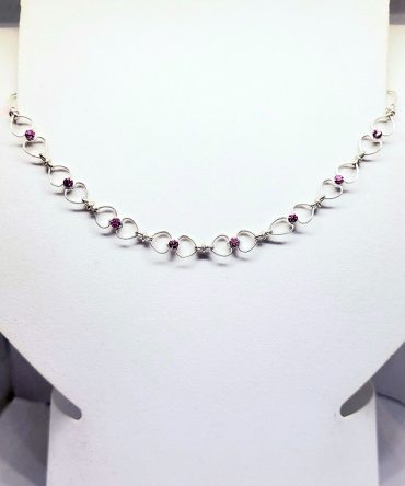Gold heart pink gem necklace