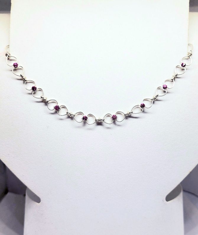Gold heart pink gem necklace