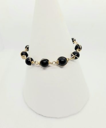 Black bead gold bracelet