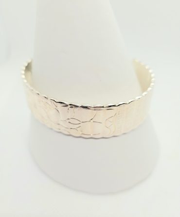 Chunky silver flower bangle