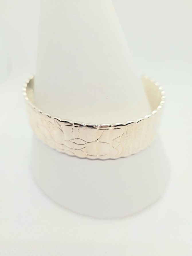 Chunky silver flower bangle