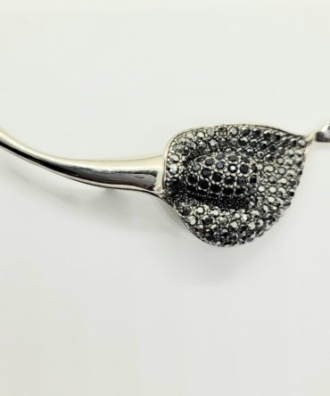 Black flower brooch
