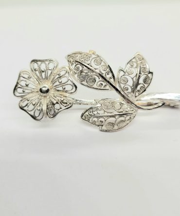 Small silver flower brooch