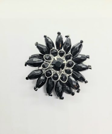 Black flower brooch