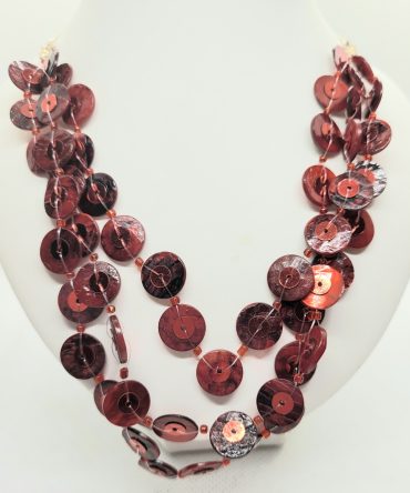 Red multi strand necklace