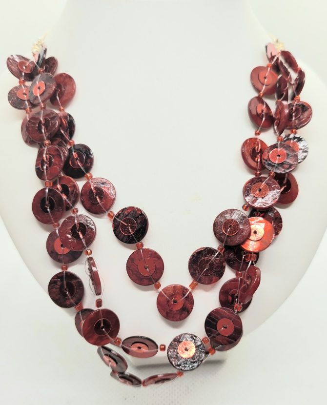 Red multi strand necklace