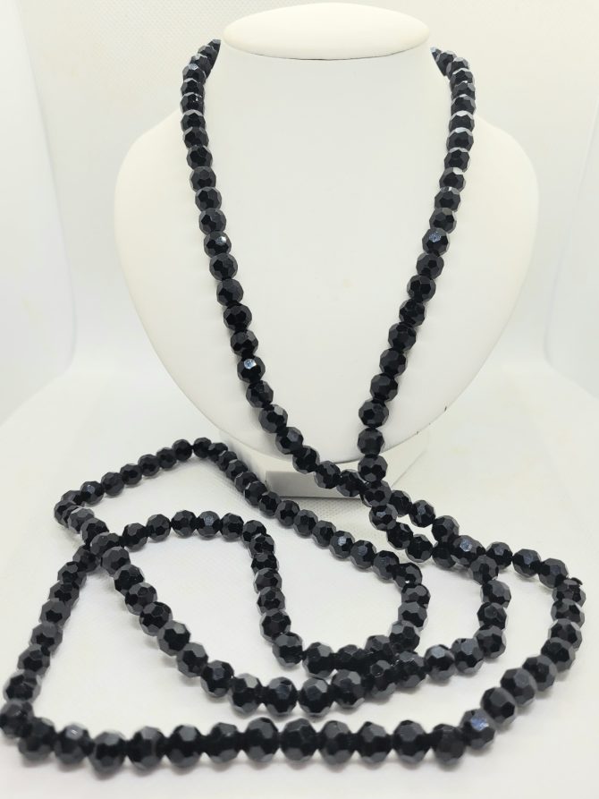 Very long black necklace